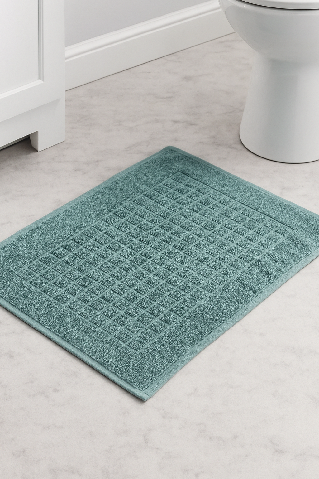 Alfombra tipo toalla para baño